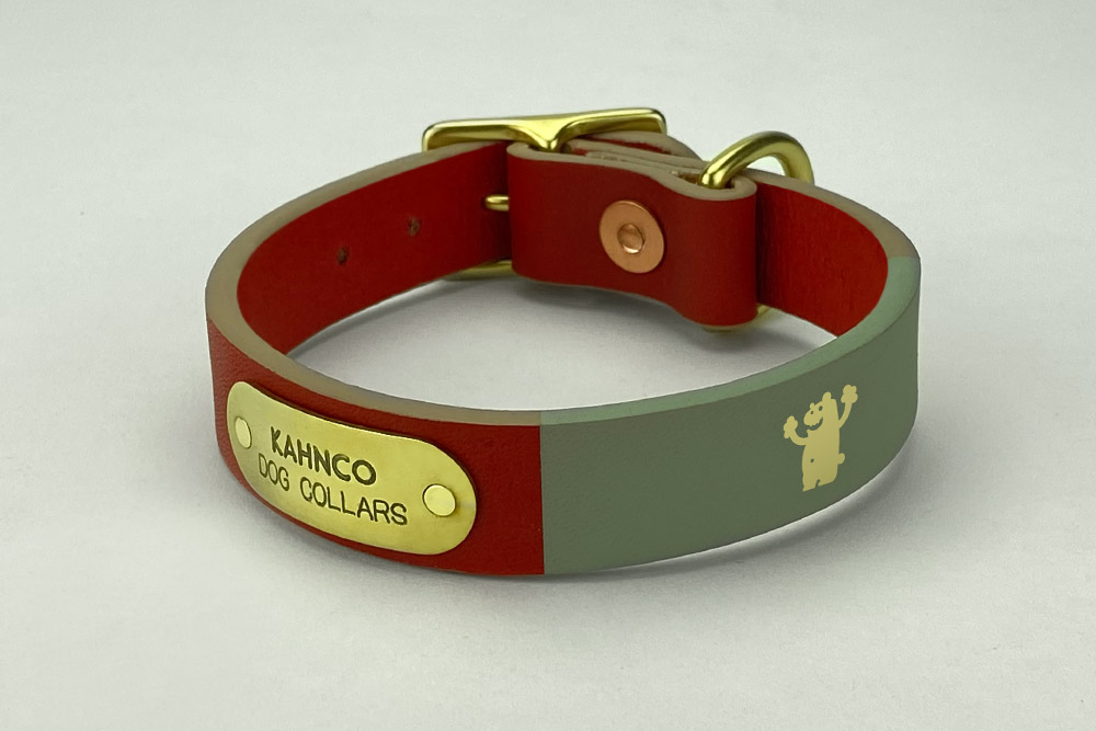 #11. Red leather, grey band, gold bear, sandstone edge, natural brass hardware. Shown in 3/4” width.