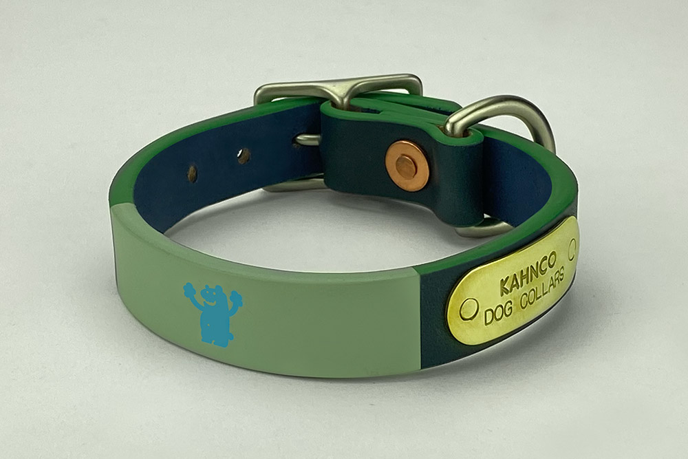 #19. Navy leather, grey band, baby blue bear, grass green edge, satin nickel hardware. Shown in 3/4” width.