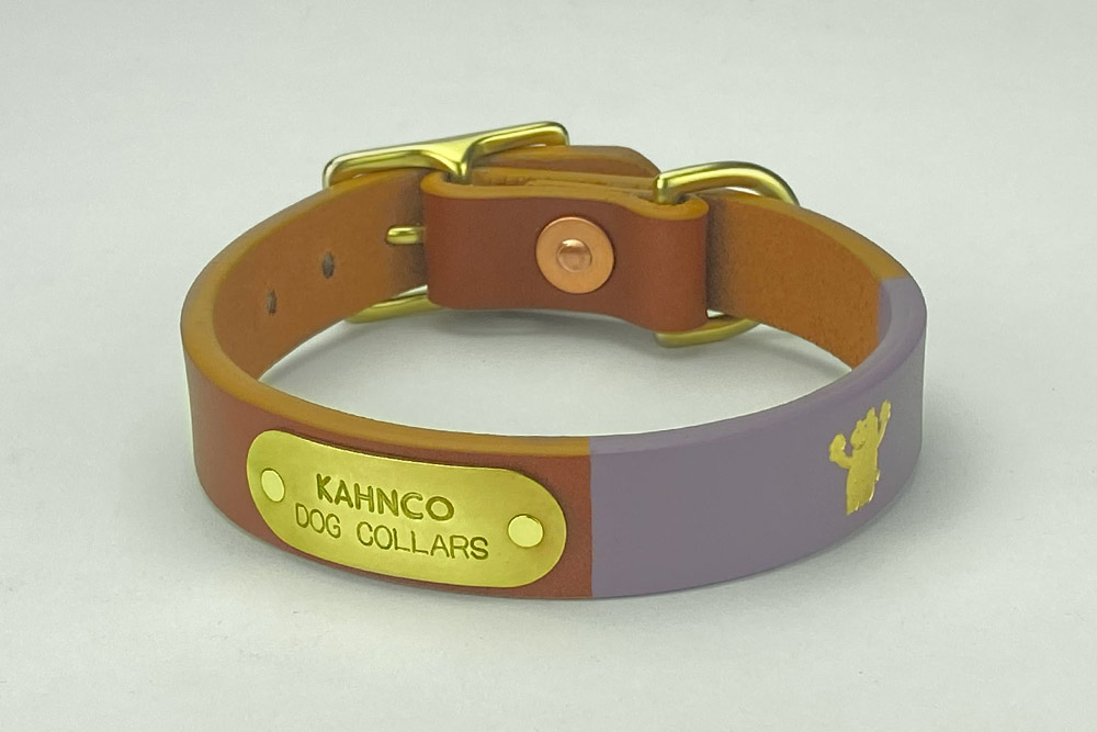 #6. Chestnut leather, violet band, gold bear, marigold edge and brass hardware. Shown in 3/4” width.
